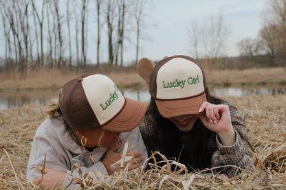 Lucky Girl Trucker Hat - The Cozy Coast X Rise Above Fall Below